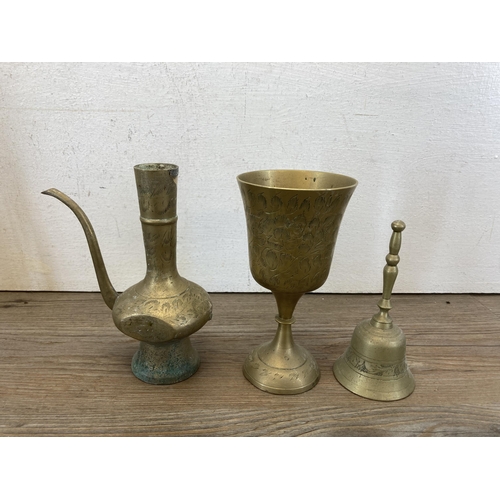 330 - A collection of metalware to include pair of brass swans, brass graduating dessert pans, pair of bra... 