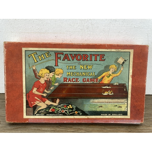 343 - A vintage The Favorite Mechanical race game