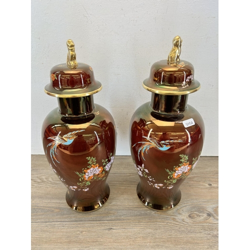 176 - A pair of Carlton Ware Rouge Royale ginger jars and covers - approx. 38cm high