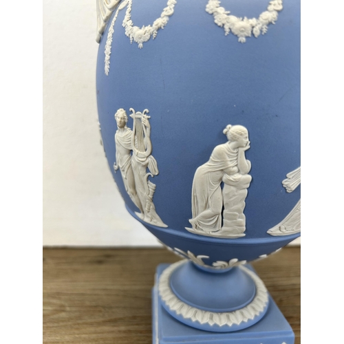 177 - A Wedgwood pale blue Jasperware twin handled urn vase and cover - approx. 30cm high