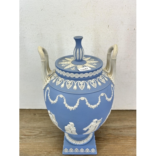 177 - A Wedgwood pale blue Jasperware twin handled urn vase and cover - approx. 30cm high