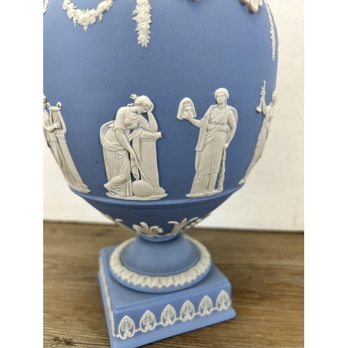 177 - A Wedgwood pale blue Jasperware twin handled urn vase and cover - approx. 30cm high