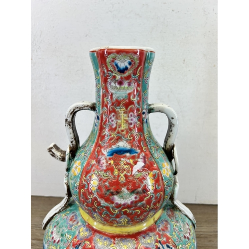 184 - A Chinese Famille Rose twin handled vase - approx. 32cm high