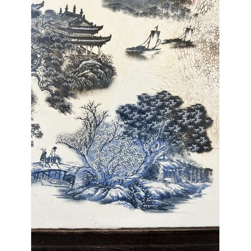 189 - A framed Chinese porcelain wall plaque - approx. 37cm high x 28cm wide