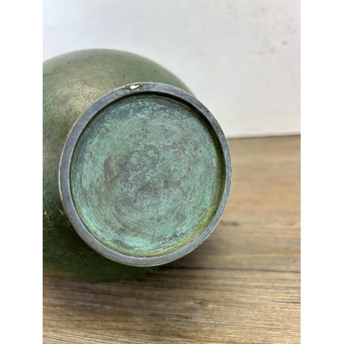 191 - A Japanese patinated bronze bottle neck vase with character mark to base - approx. 24cm high