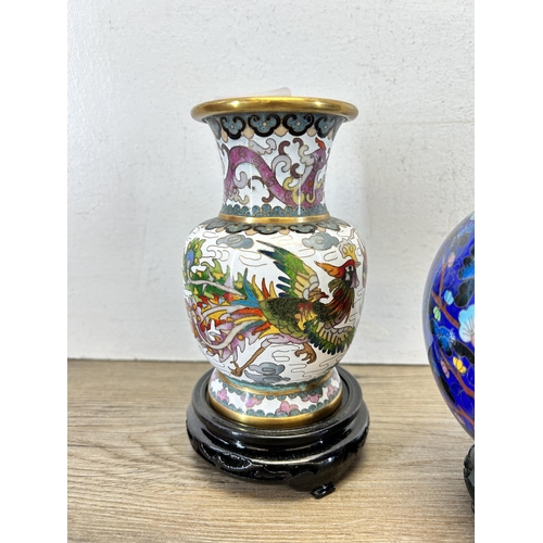 192 - Two Oriental Cloisonné vases with stands - largest approx. 18cm high