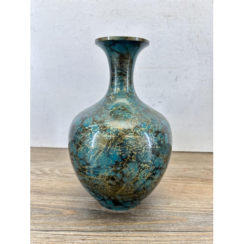 194 - A Japanese patinated Verdigris effect metal bottle neck vase - approx. 20cm high