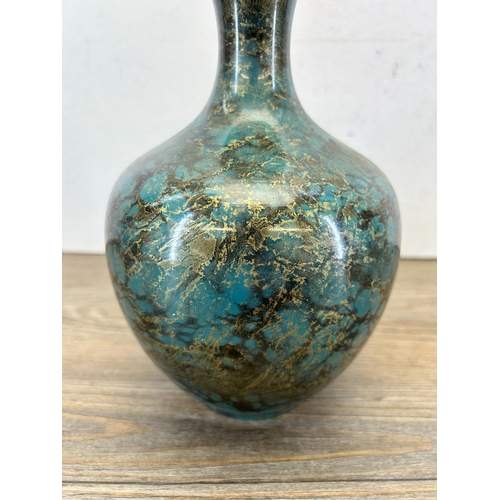 194 - A Japanese patinated Verdigris effect metal bottle neck vase - approx. 20cm high