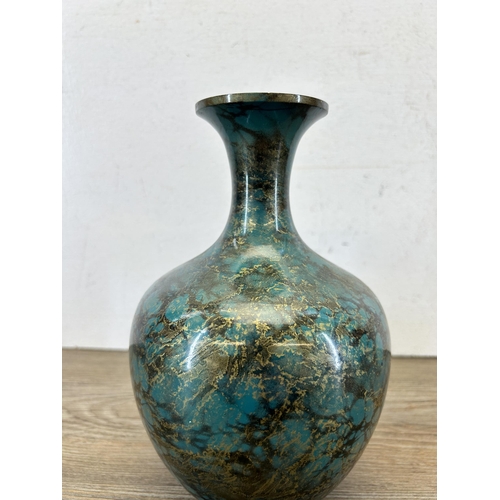 194 - A Japanese patinated Verdigris effect metal bottle neck vase - approx. 20cm high