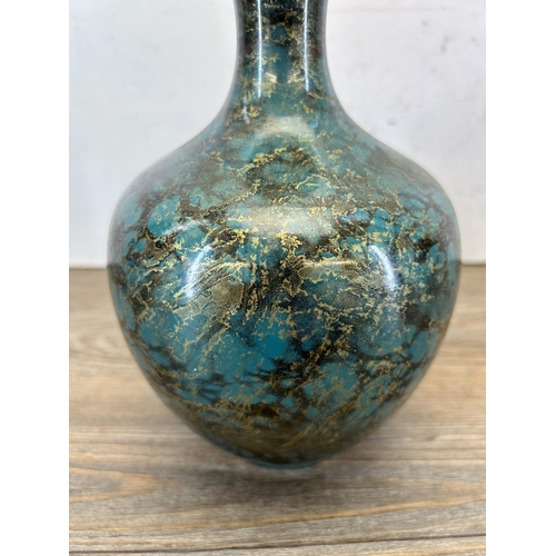 194 - A Japanese patinated Verdigris effect metal bottle neck vase - approx. 20cm high