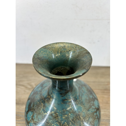 194 - A Japanese patinated Verdigris effect metal bottle neck vase - approx. 20cm high