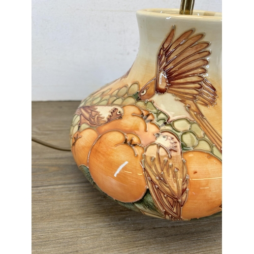 204 - A Moorcroft Pottery Finches and fruit pattern table lamp - approx. 29cm high x 25cm diameter