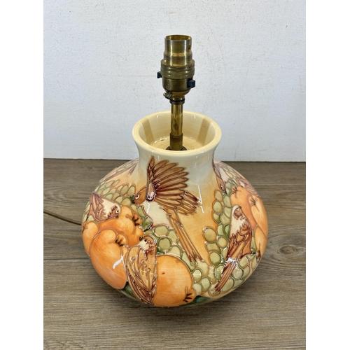 204 - A Moorcroft Pottery Finches and fruit pattern table lamp - approx. 29cm high x 25cm diameter