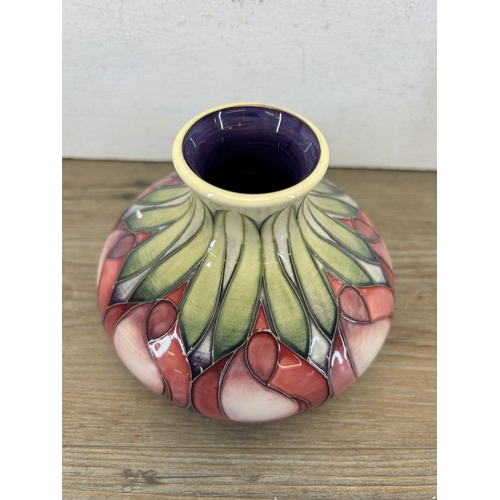 211 - A Moorcroft Pottery April Tulip pattern 32/5 vase designed by Emma Bossons - approx. 10.5cm high