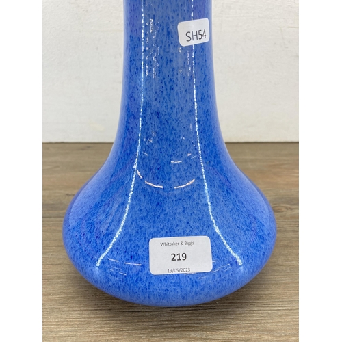 219 - A Cobridge Stoneware blue glazed tapered vase - approx. 32cm high