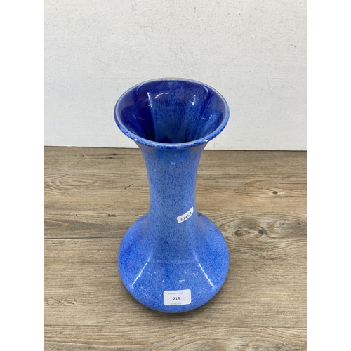 219 - A Cobridge Stoneware blue glazed tapered vase - approx. 32cm high