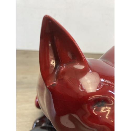 229 - A Royal Doulton Flambé fox figurine - approx. 25cm high