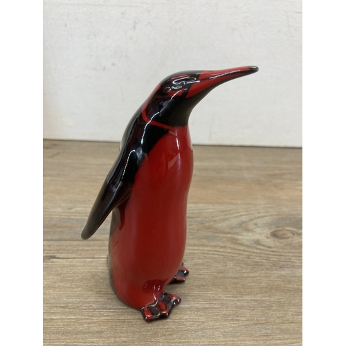 231 - A boxed Royal Doulton Flambé penguin figurine - approx. 15cm high