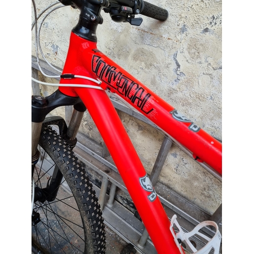 635 - A Commencal El Camino custom men's neon pink mountain bike with Shimano Alivio 24 speed gear system