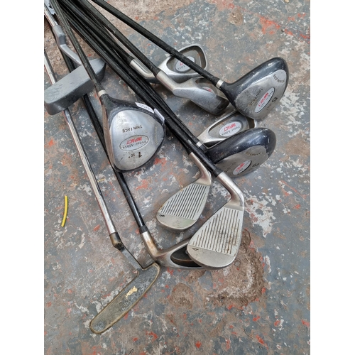 645 - A set of 10 Peter Alliss impact balance golf clubs