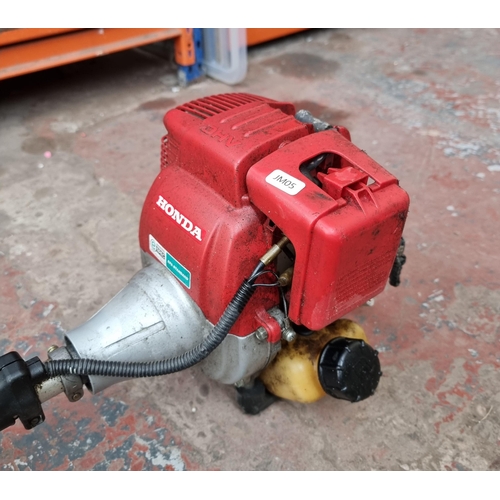 667 - A Honda petrol strimmer