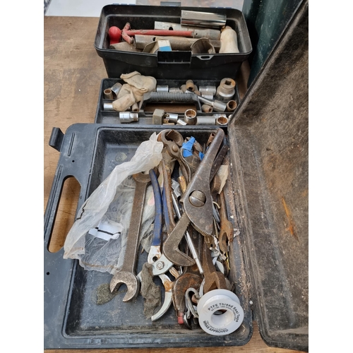 677 - Three tool boxes containing tools to include, sockets, pipe wrenches, screwdrivers etc.