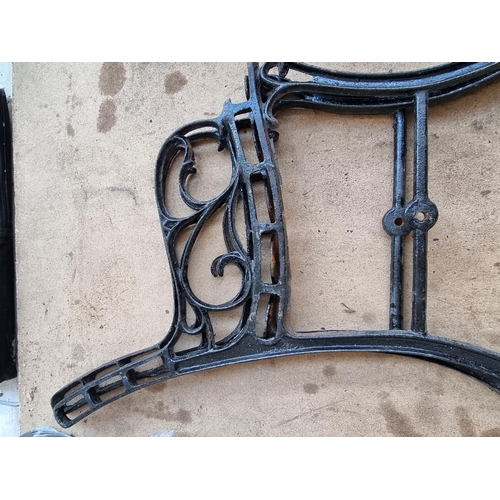 686 - Two pairs of 19th century style cast iron green painted garden bench ends with oak armrests