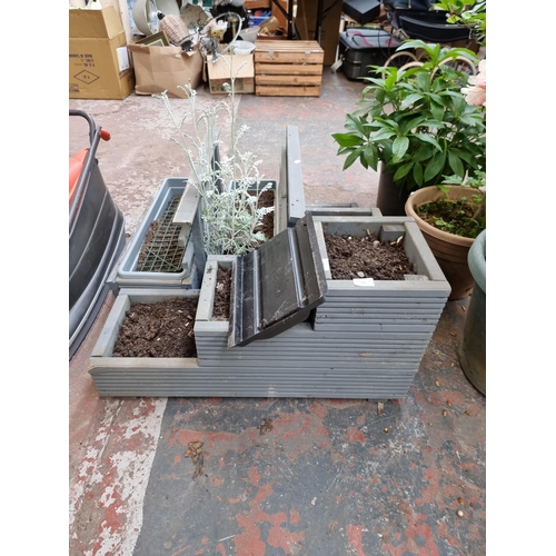 708 - Three grey painted wooden planters