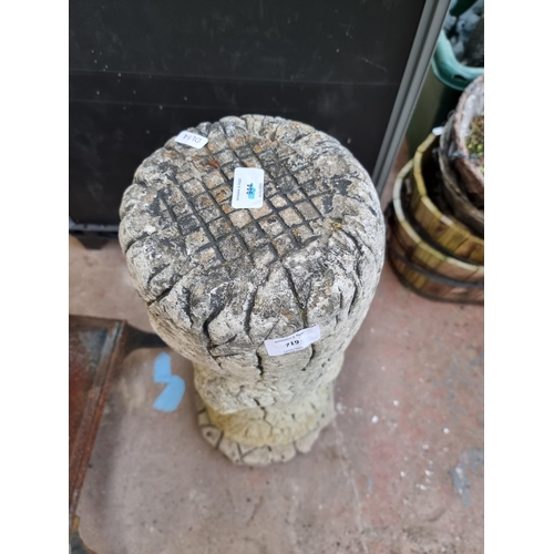 719 - A cast stone bird bath base in the form of a tree trunk - approx. 64cm high