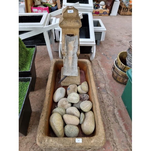 728 - Two Sandstone garden items, one trough and one Oriental style water feature