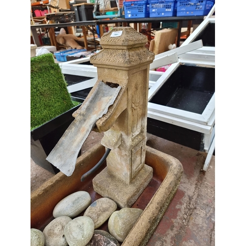 728 - Two Sandstone garden items, one trough and one Oriental style water feature