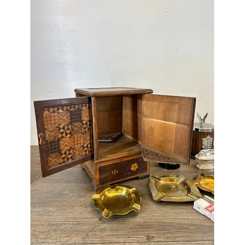 478 - A collection of tobacciana to include inlaid wooden four door smoker's cabinet, brass ashtrays, Rons... 