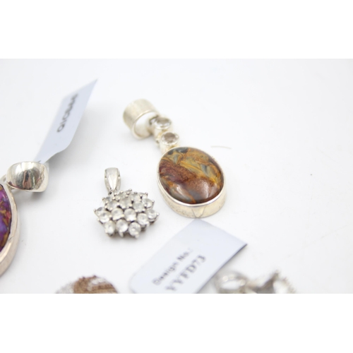 1152 - Twelve .925 silver gemstone set pendants to include TGGC etc. - approx. gross weight 41 grams