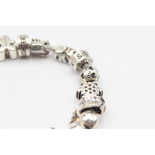 1157 - Three .925 silver charm bracelets with charms - approx. gross weight 139 grams