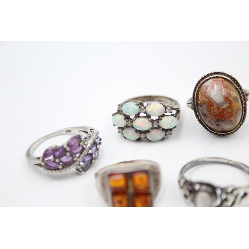 1169 - Twelve .925 silver gemstone set rings to include diamond etc. - approx. gross weight 47 grams