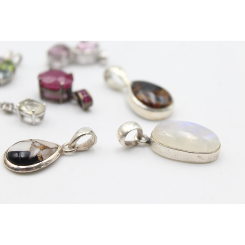 1170 - Twelve .925 silver gemstone set pendants to include TGGC etc. - approx. gross weight 41 grams