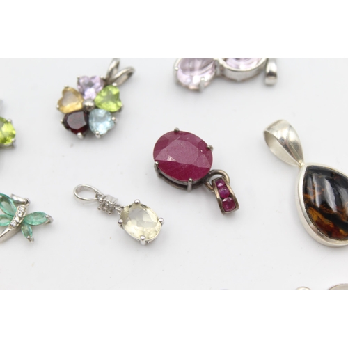 1170 - Twelve .925 silver gemstone set pendants to include TGGC etc. - approx. gross weight 41 grams