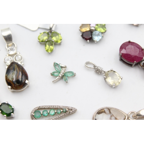 1170 - Twelve .925 silver gemstone set pendants to include TGGC etc. - approx. gross weight 41 grams