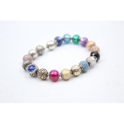 1171 - Five Pandora .925 silver bracelets with assorted charms - approx. gross weight 85 grams