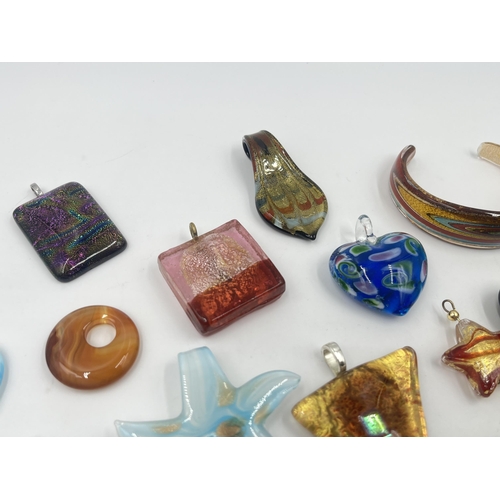 1191 - A collection of art glass pendants