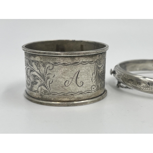 1196 - Two pieces of hallmarked sterling silver, one Chester napkin ring and one Birmingham bangle - approx... 