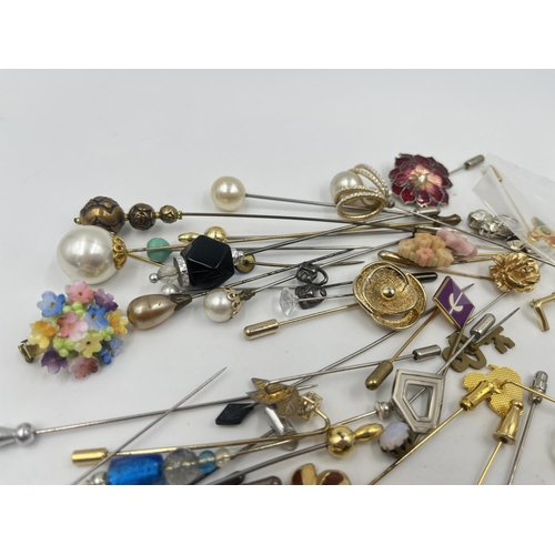 1200 - A collection of vintage hat pins and brooches