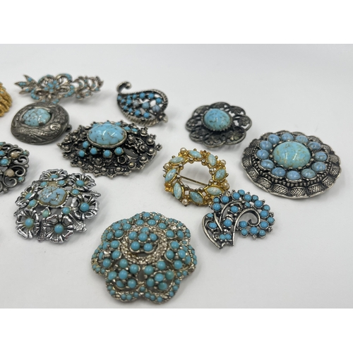 1201 - A collection of vintage turquoise brooches to include Miracle etc.