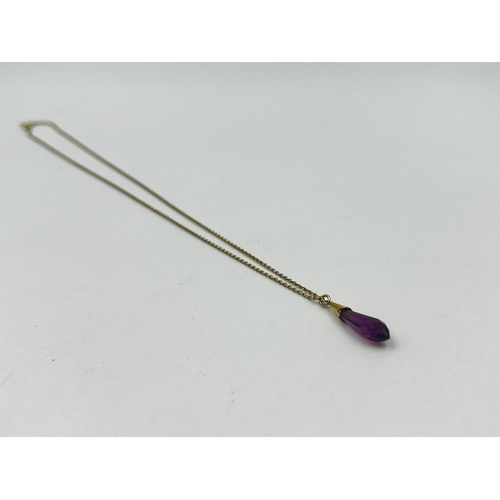 1209 - A 9ct gold amethyst pendant necklace - approx. gross weight  2.49 grams