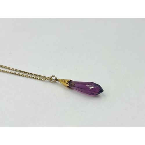 1209 - A 9ct gold amethyst pendant necklace - approx. gross weight  2.49 grams