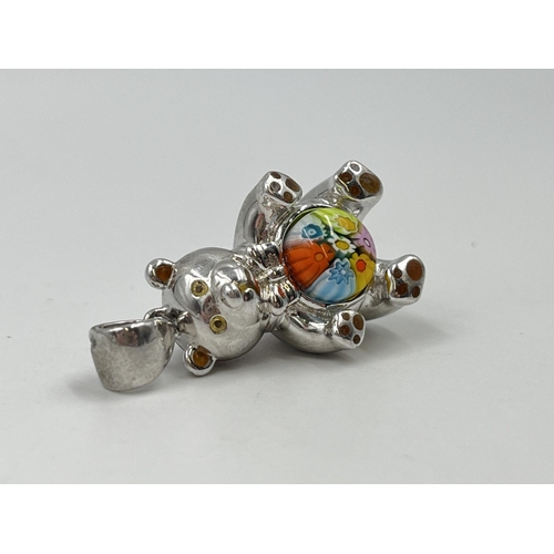 1213 - A vintage Alan K .925 silver and millefiori glass teddy bear pendant and five pieces of millefiori g... 