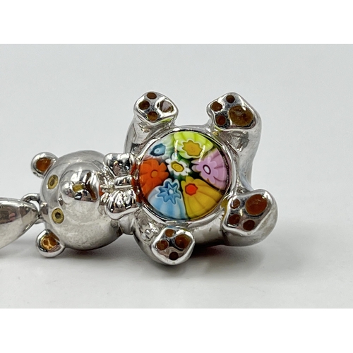 1213 - A vintage Alan K .925 silver and millefiori glass teddy bear pendant and five pieces of millefiori g... 