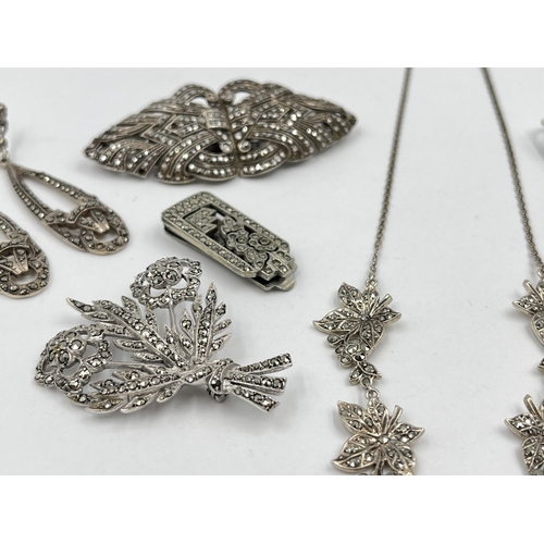 1215 - Eight pieces of silver and white metal marcasite jewellery to include pair of sterling silver leaf s... 