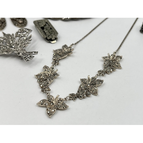 1215 - Eight pieces of silver and white metal marcasite jewellery to include pair of sterling silver leaf s... 