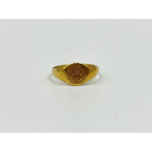 1217 - A George V 18ct gold signet ring, hallmarked Birmingham 1912, size N - approx. gross weight 3.49 gra... 